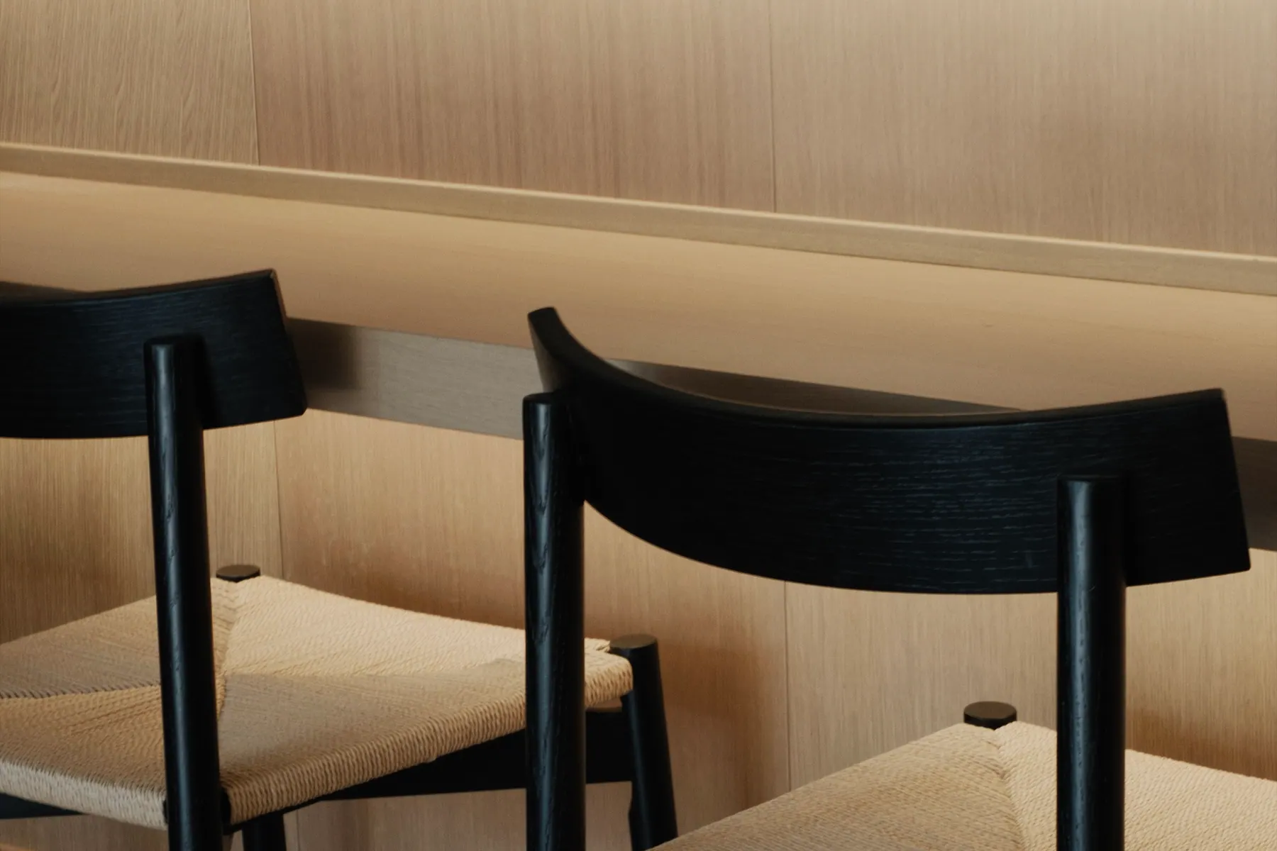 Chairs drawn up to the counter, set before service